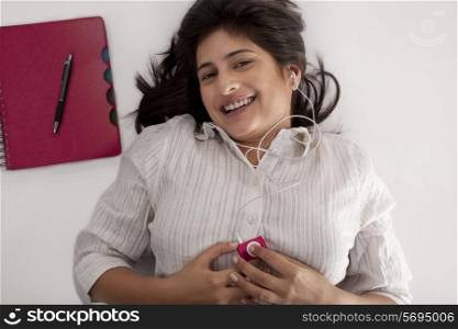 Woman listening to music on her I-pod