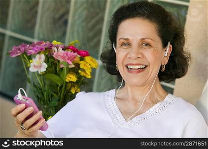 Woman Listening to Music on iPod