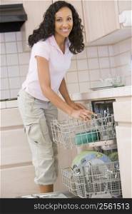 Woman Loading Dishwasher