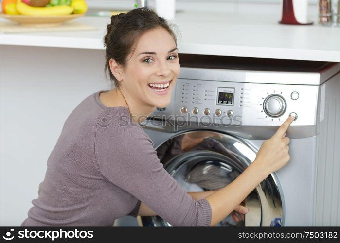 woman looking at camera while doing a machine