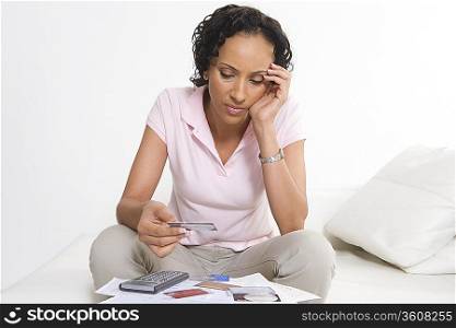 Woman Looking at Credit Cards