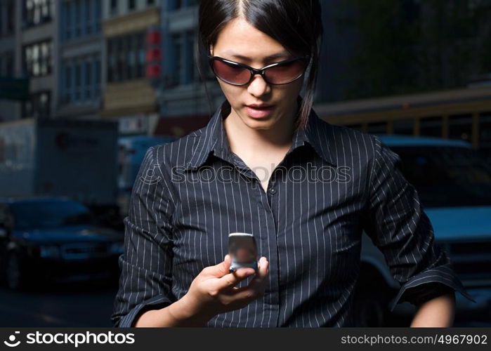 Woman looking at text message