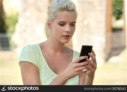 Woman looking mobile message