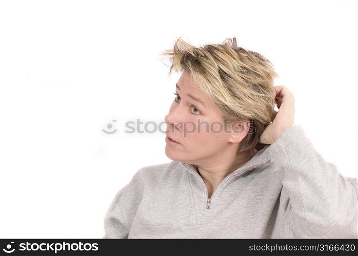 Woman looking slightly puzzled