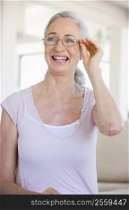 Woman Looking Through New Glasses