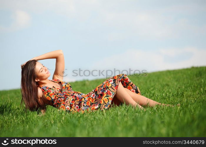 Woman lying in a field