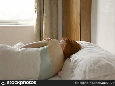 woman lying in bed