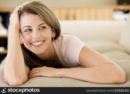 Woman lying in living room