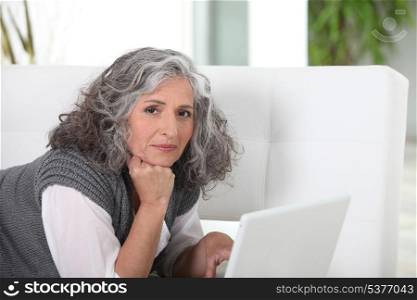 Woman lying on couch