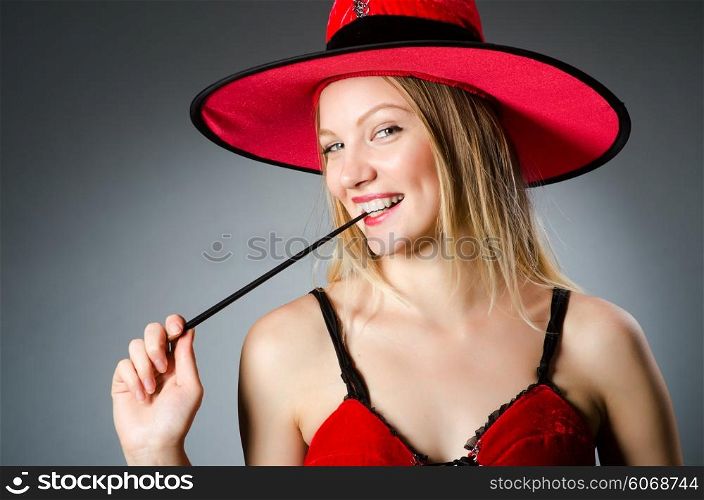 Woman magician doing her tricks with wand