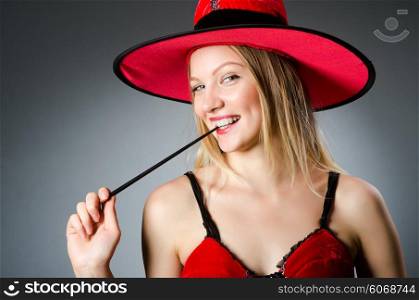 Woman magician doing her tricks with wand