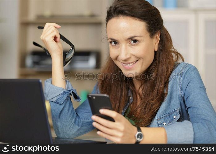 woman make online shopping on her phone