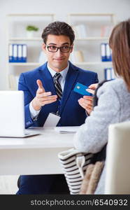 Woman makes payment with credit card