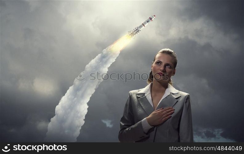 Woman making an oath. Young businesswoman and flying in sky space rocket