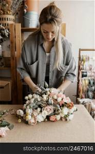 woman making beautiful floral arrangement 2