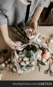 woman making beautiful floral bouquet 2