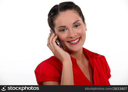 Woman making call on mobile telephone