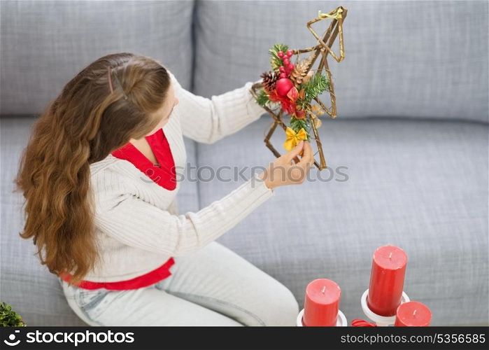 Woman making Christmas decorations