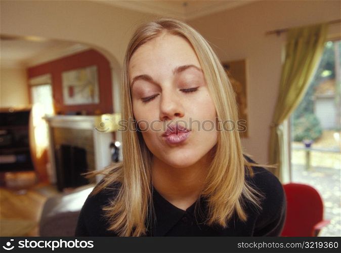 Woman Making Kissy Face