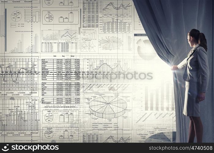 Woman making presentation. Young businesswoman opening curtain and presenting sales report