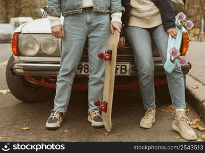 woman man holding their skateboards 2