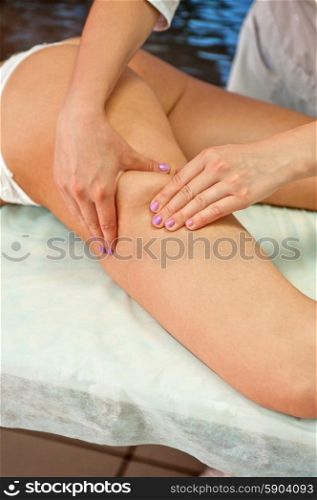 woman massage. Legs and buttocks woman massage to reduce cellulite