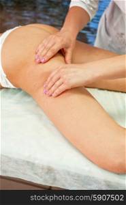 woman massage. Legs and buttocks woman massage to reduce cellulite