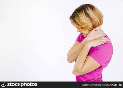 woman massaging neck having pain