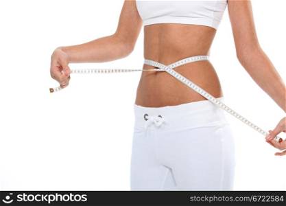 Woman measuring the waist
