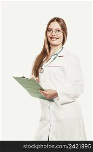 Woman medical doctor with stethoscope, clipboard and pen wearing white coat isolated. Professional health care.