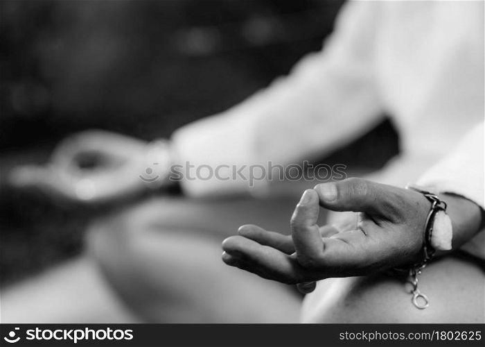 Woman meditating, balancing energy. Hands in mudra position.. Self-Healing Mindfulness Meditation