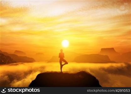 Woman meditating in tree yoga position on the top of mountains above clouds at sunset. Zen, meditation, peace