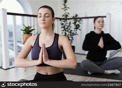 woman meditating indoor 5