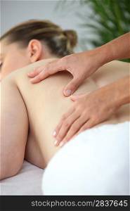 Woman mid back massage