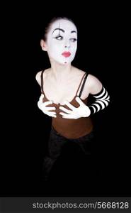 woman mime in white gloves on black background denghu