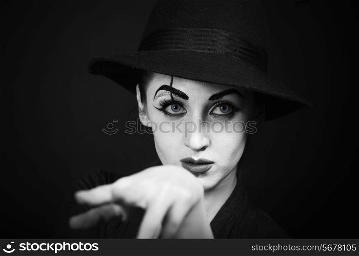 woman mime with theatrical makeup on black background&#xA;