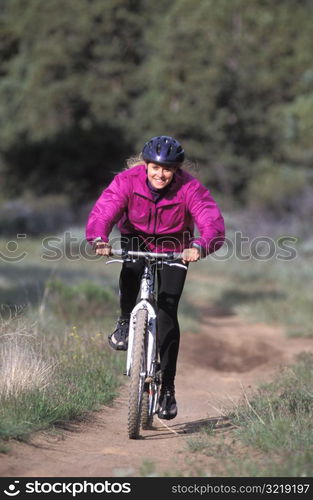 Woman Mountain Biking