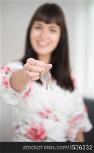Woman Moving Into New Home Holding Bunch Of Keys