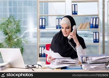 Woman muslim employee working in the office 