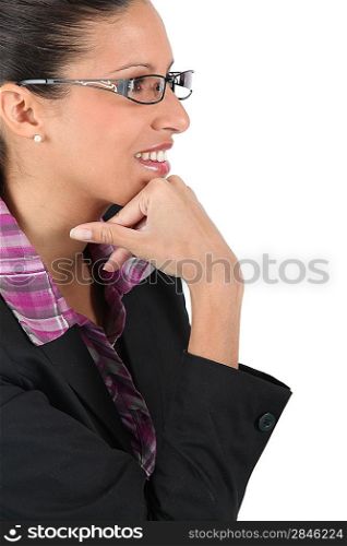Woman observing away with eyeglasses