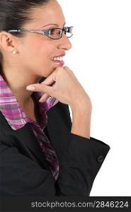Woman observing away with eyeglasses