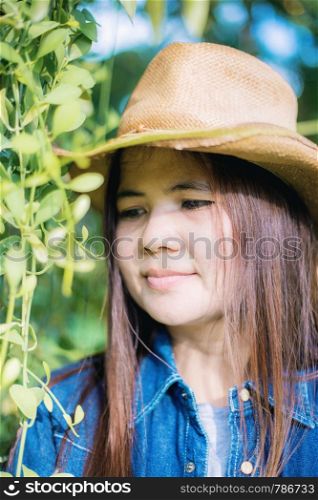 Woman of asian in garden with the sunlight.