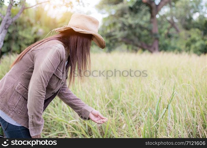 Woman of farmer in rural with the sunlight.