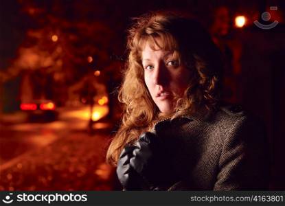 woman on a red night street