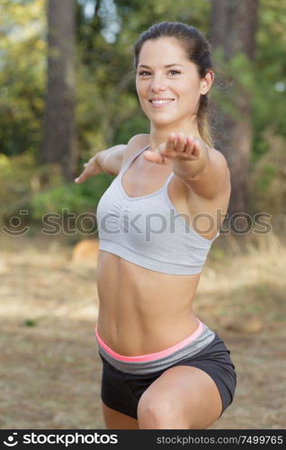 woman on a yoga mat outdoors