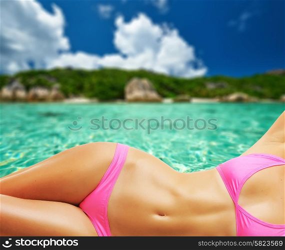 Woman on beautiful beach at Seychelles, La Digue, Anse Source d&rsquo;Argent. Collage.