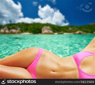Woman on beautiful beach at Seychelles, La Digue, Anse Source d&rsquo;Argent. Collage.