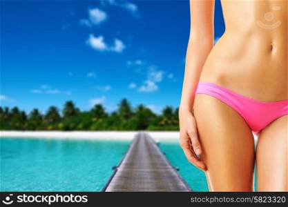Woman on beautiful beach with jetty at Maldives. Collage.
