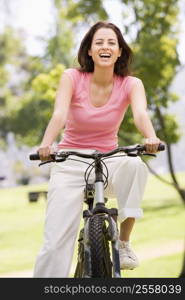 Woman on bicycle smiling