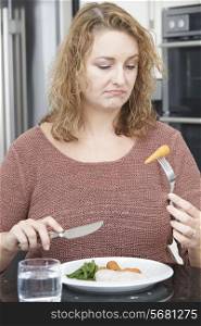 Woman On Diet Fed Up With Eating Healthy Meal